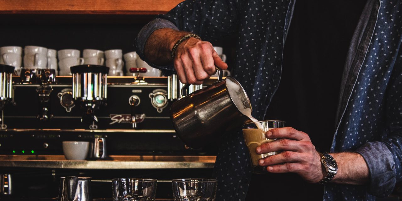 Coffee Shop Employee Making Latte