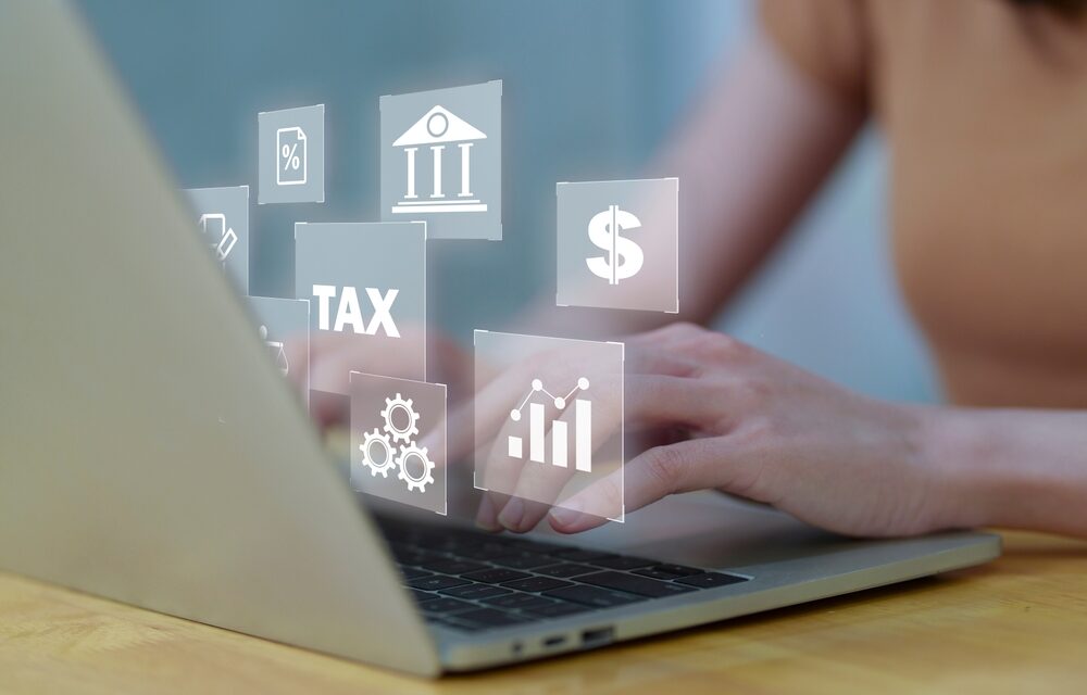 Female,Using,A,Computer,To,Complete,Individual,Income,Tax,Return
